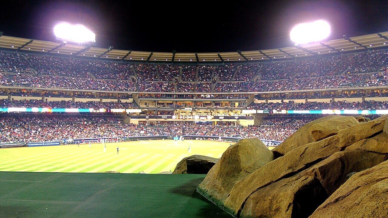 A baseball stadium during a night game