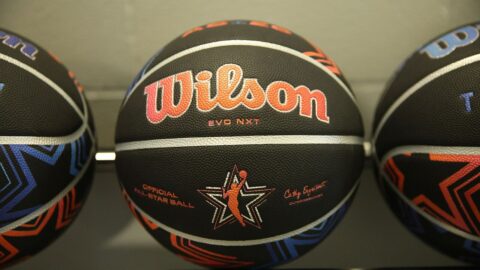 A women's basketball game in an arena