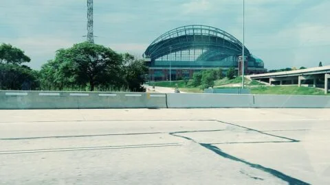 Milwaukee Brewers home stadium exterior under a bright sky
